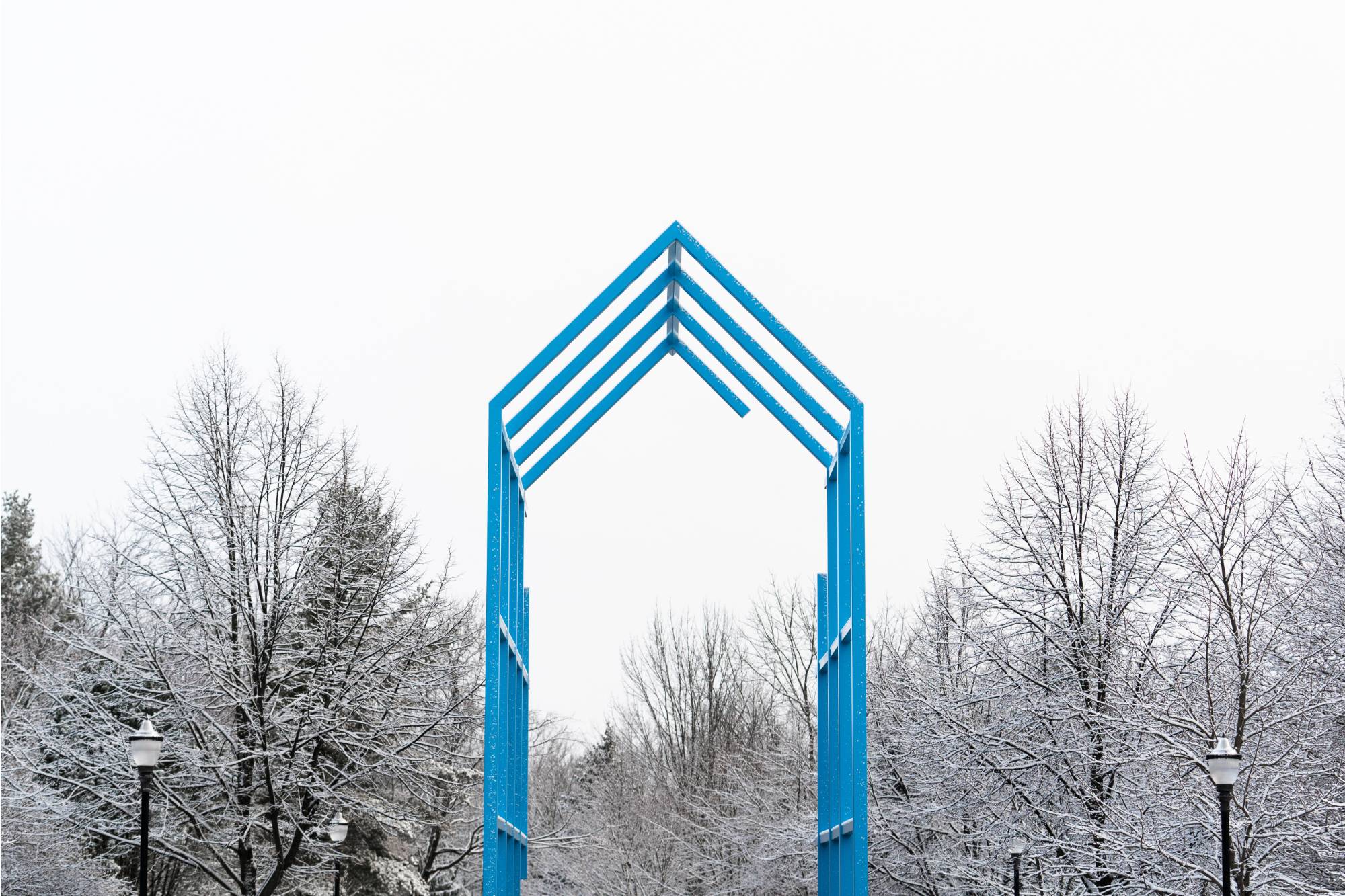 The blue Transformational Link on GVSU's Allendale Campus in the winter with snow on the ground